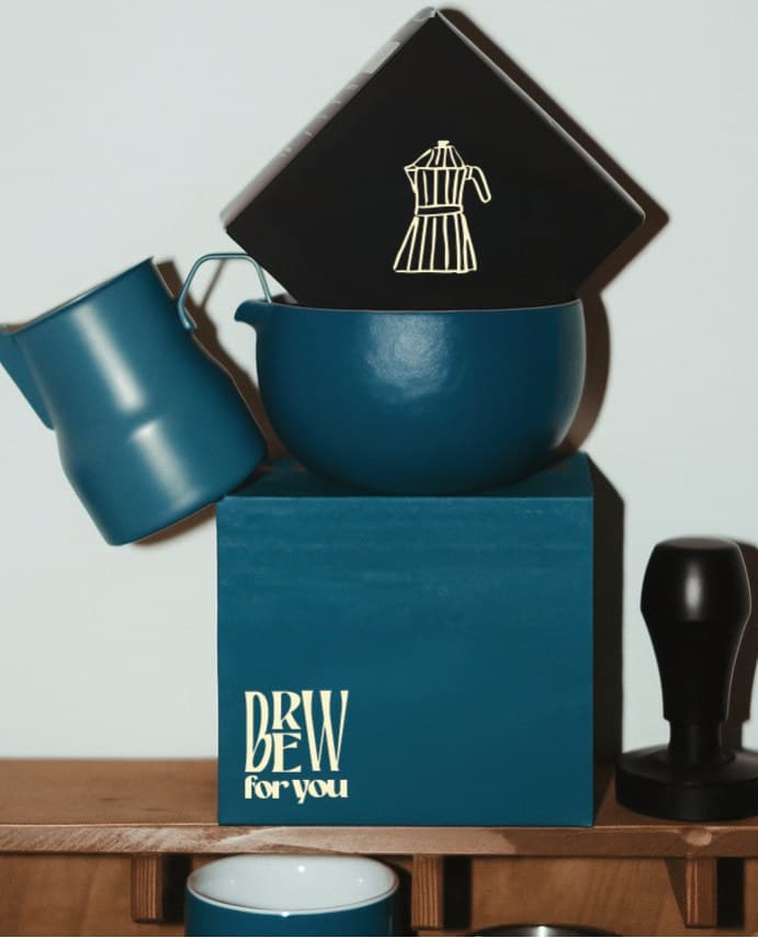 Teal coffee gear on a Brew for You box