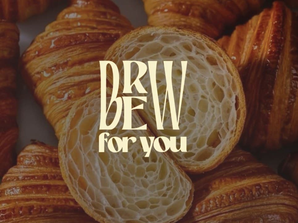 The Brew for You logo over a tray of croissants
