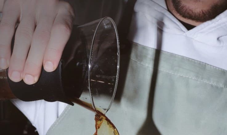 Close-up of cold brew being poured