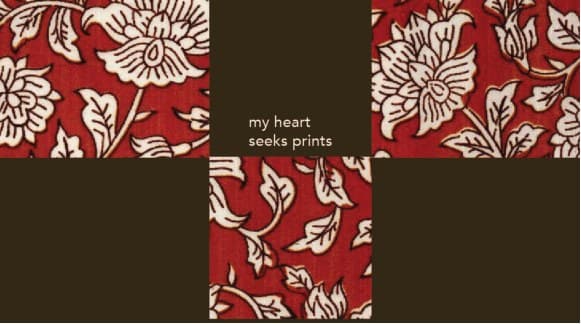 “my heart seeks prints” on brown, between squares of red floral kalamkari