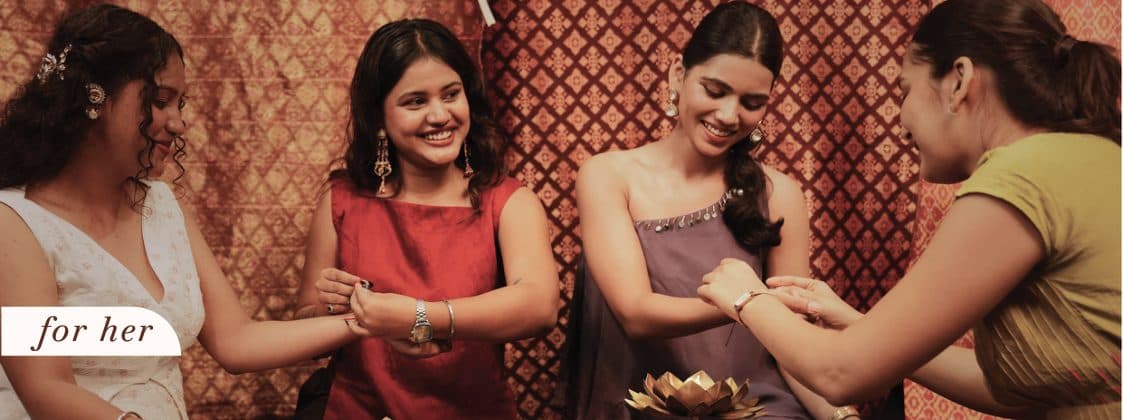 Web banner “for her”: friends tying rakhis