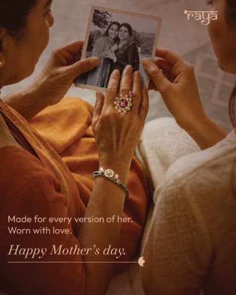 A Mother’s Day post: hands holding an old photo of a mother and daughter