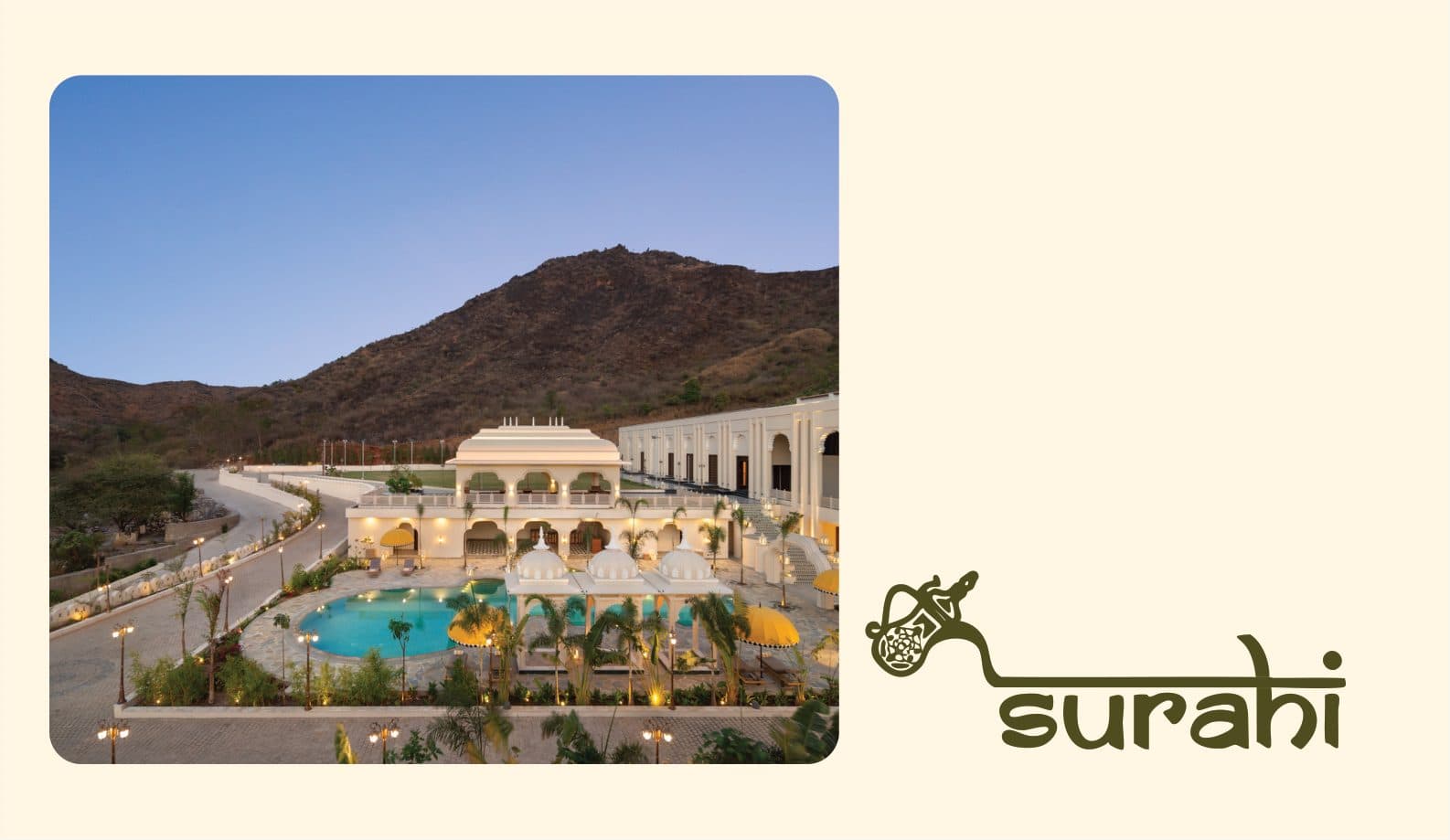Wyndham Resort, Udaipur, at dusk, beside the Surahi logo