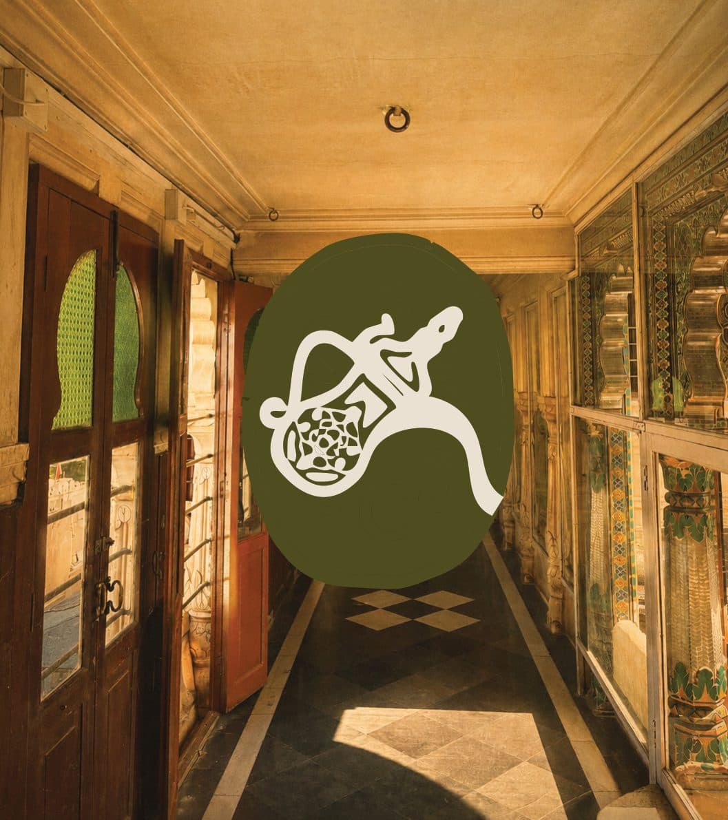 A painted palace corridor with the Surahi logomark