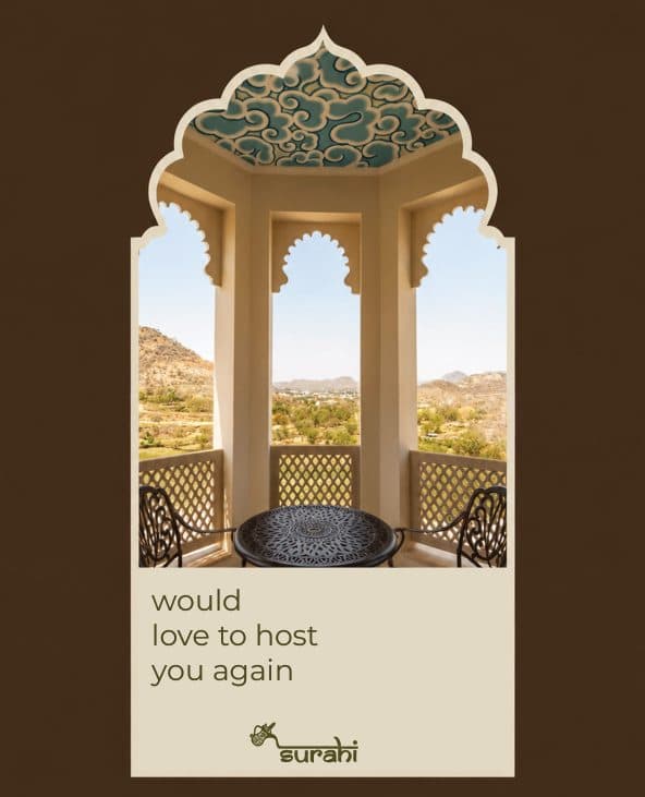 A brown card framing a pavilion arch, reading “would love to host you again”